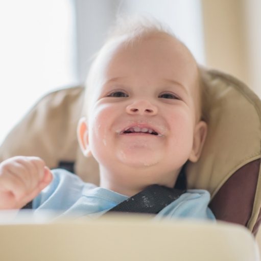 baby slouching in high chair