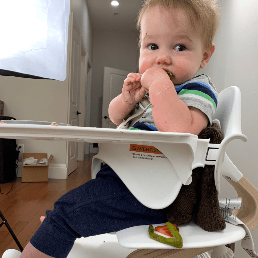 Baby sitting in outlet chair