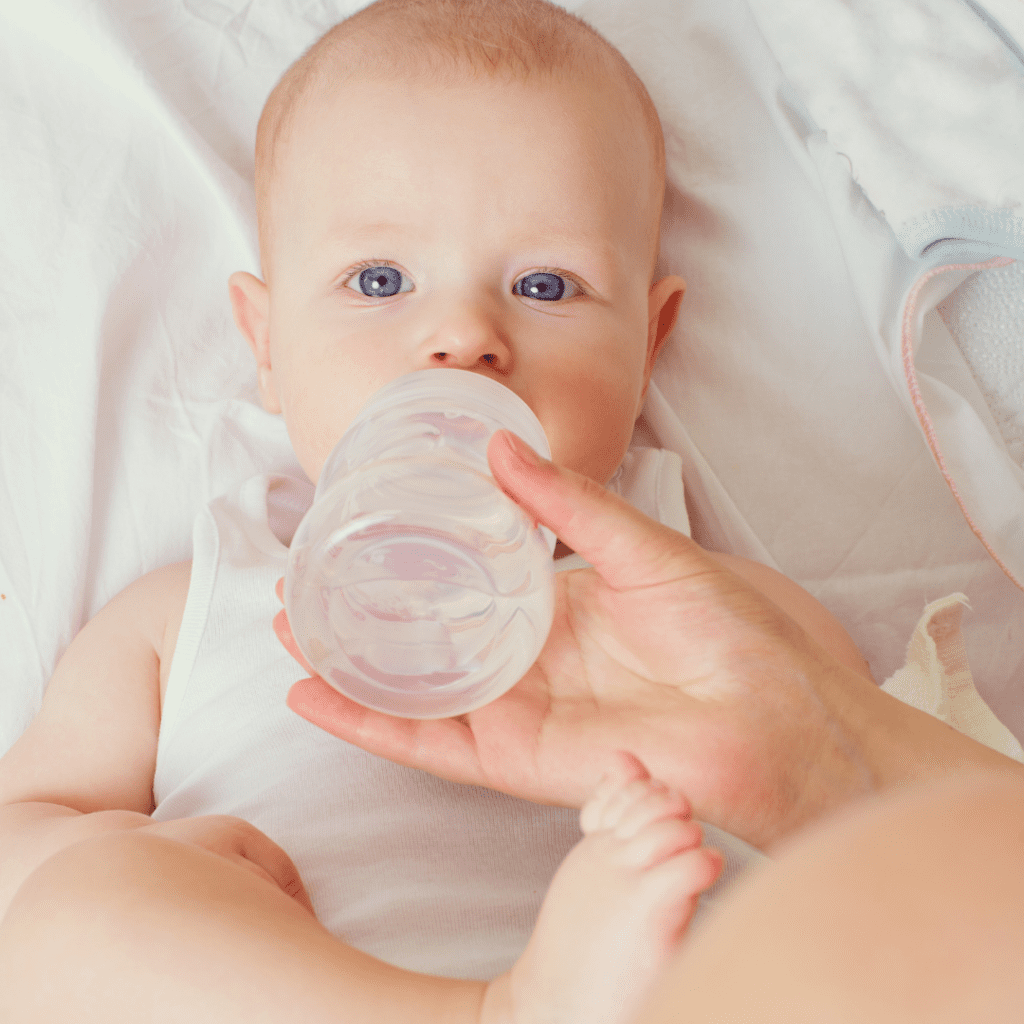 how to wean baby off bottle - baby pictured during a bottle feed