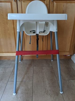 exercise band to make foot rest on highchair
