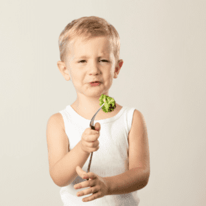 Episode art for episode: "#37: Preventing picky eating vs. reversing it". Pictured is a toddler holding broccoli on a fork with a disgusted look on their face.