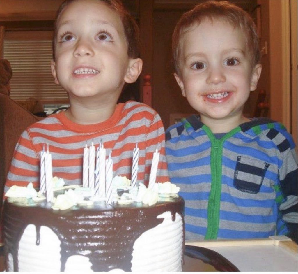 kids of a dietitian mom enjoying first birthday cake