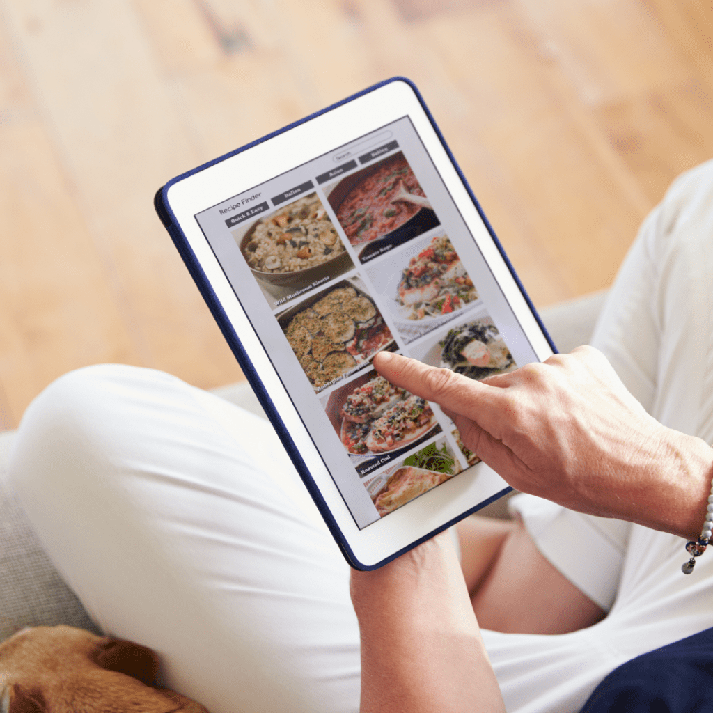 mother using tablet for meal planning ideas