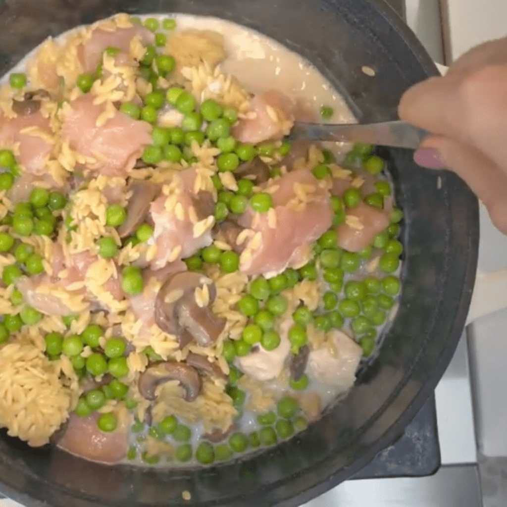 add orzo, vegetables, chicken and other ingredients to the pot