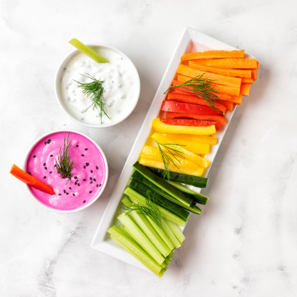 get kids involved in eating with a taste test of two different dips with veggies