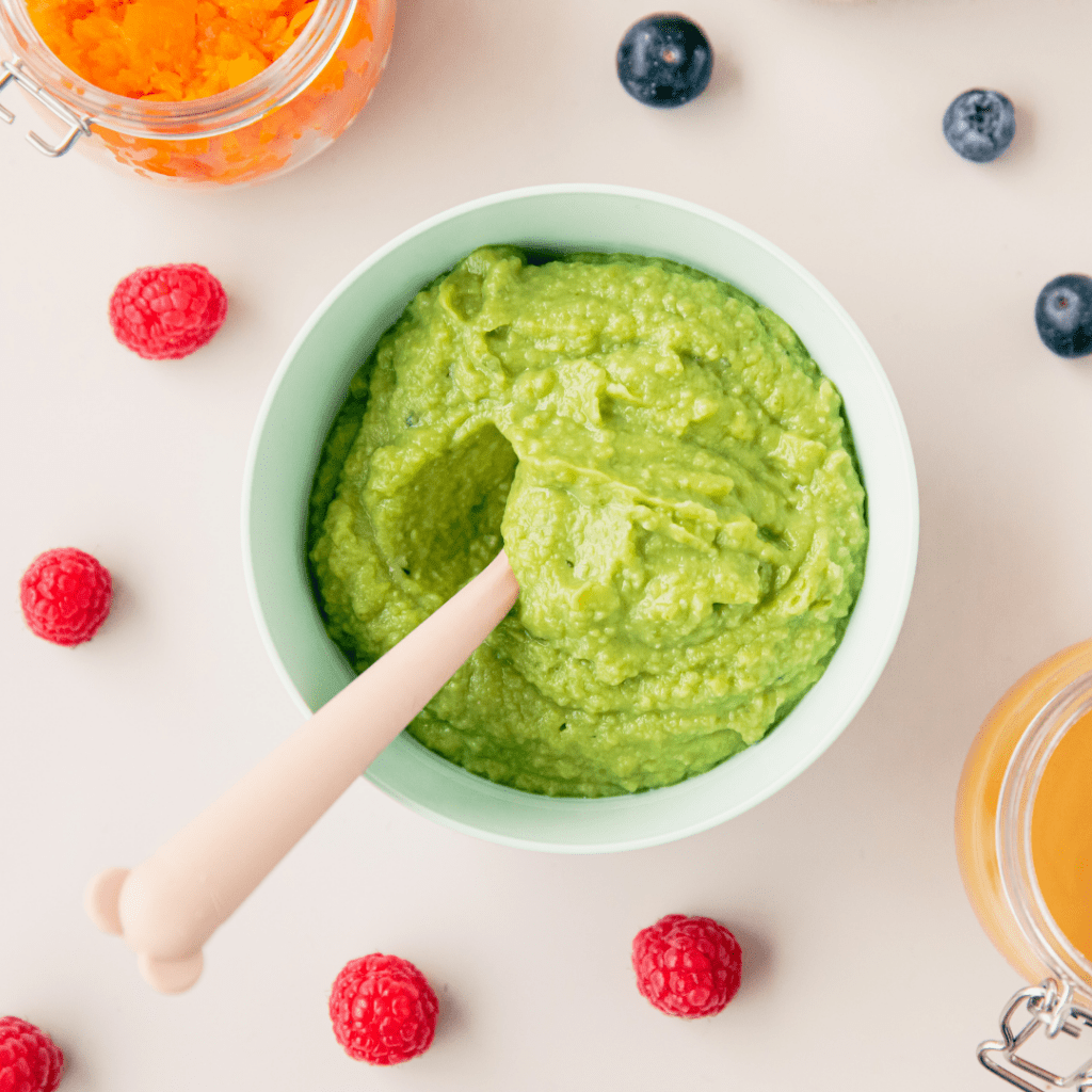 disadvantages of starting solids at 4 months; bowl of green puree