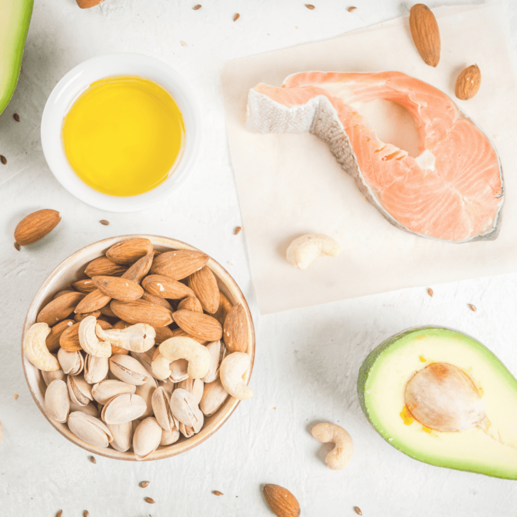 what are healthy fats for your baby; image of salmon, nuts, avocado and oil