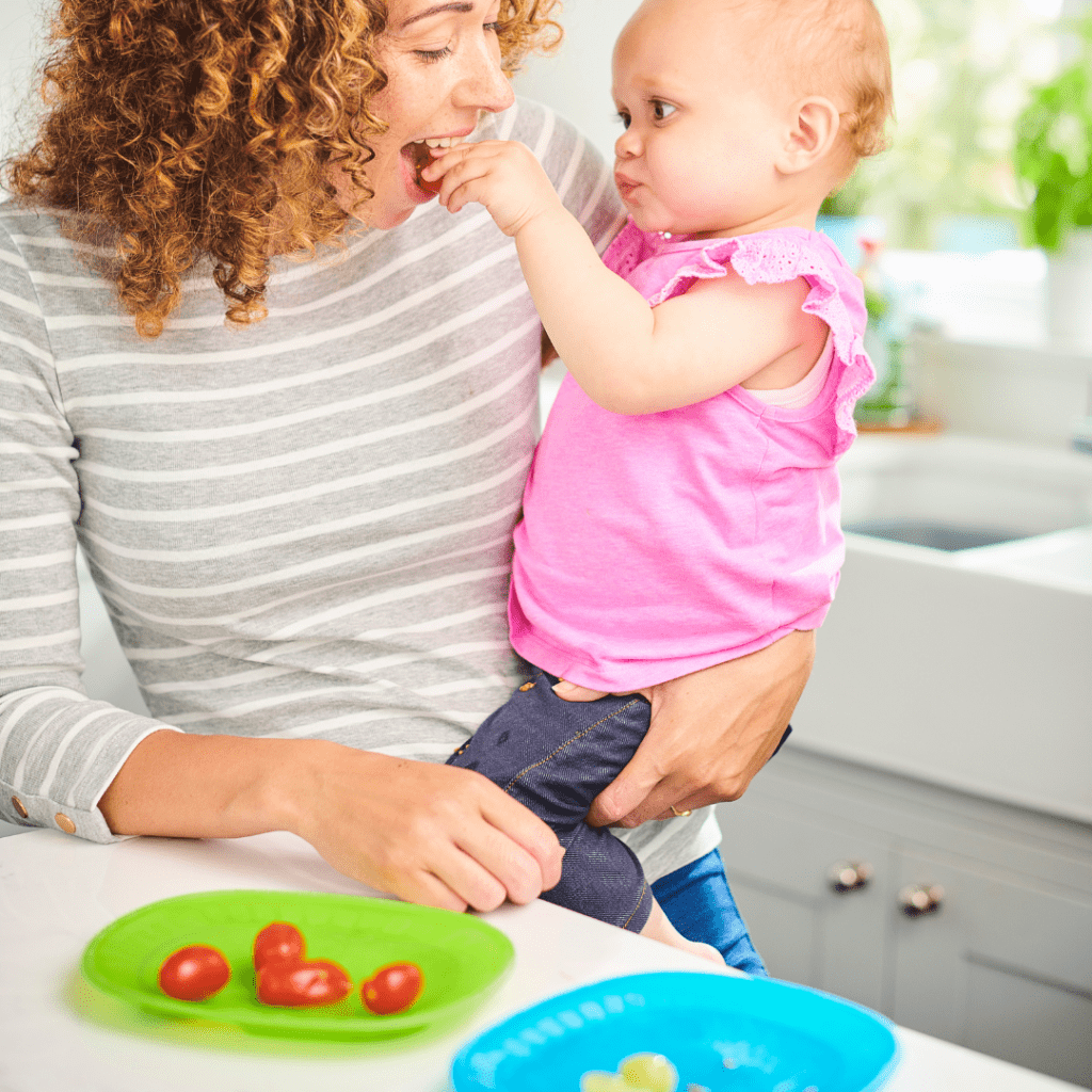 Healthy snack for toddlers to eat after daycare; baby feeding parent their uneaten food.