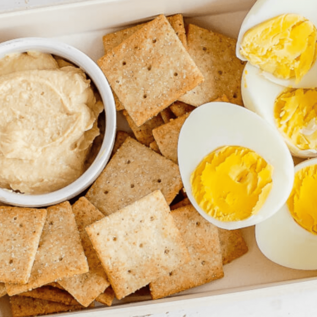 Offer balanced mini-meals to satiate hunger or a big appetite after daycare like crackers, hummus, and hard boiled egg.