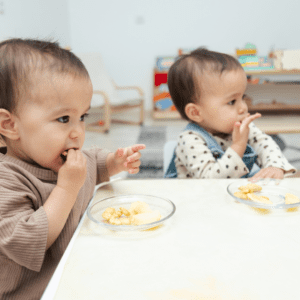 easy toddler lunch ideas for daycare; pictured are toddlers eating daycare lunch