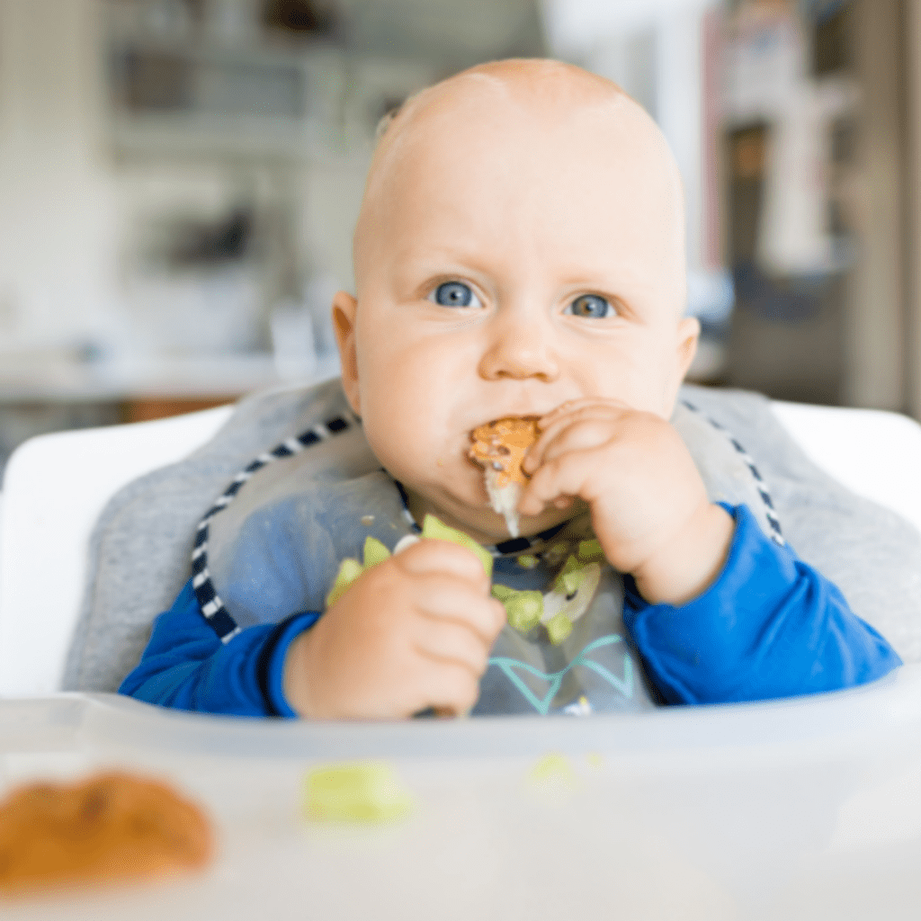 what to do during a choking episode (aka medical emergency); image of baby self feeding