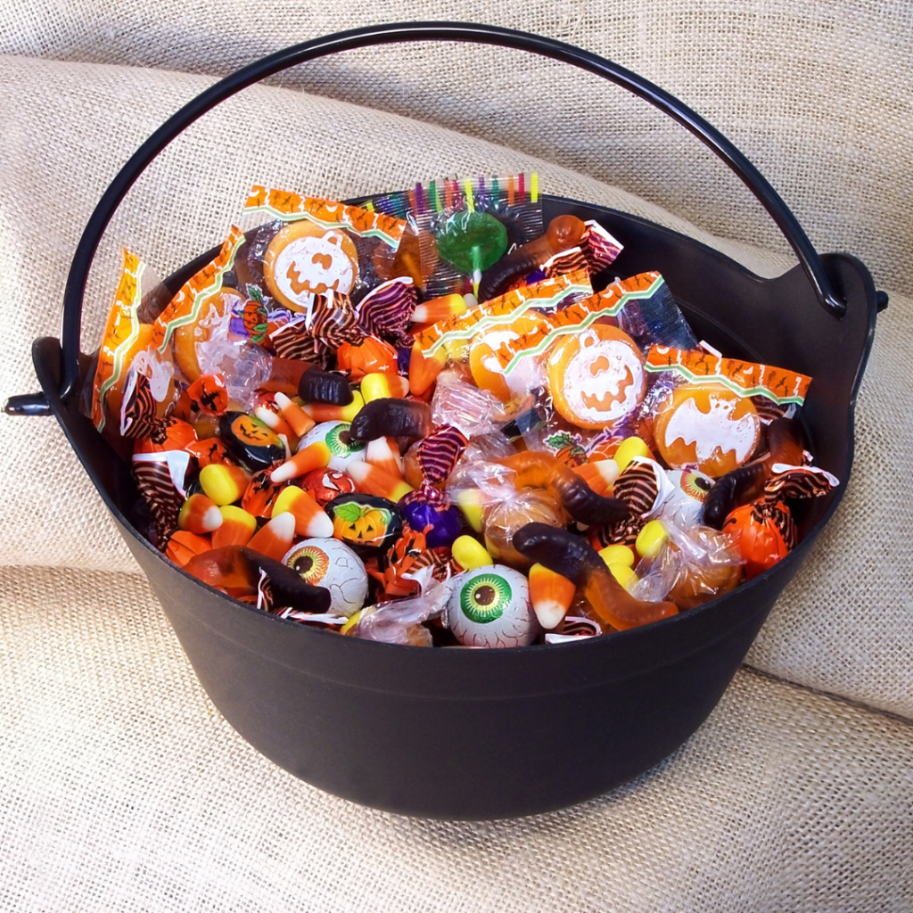 A bucket of Halloween candy. Remove choking hazards, but let them eat as much as they want on Halloween night (don't limit to a few pieces).