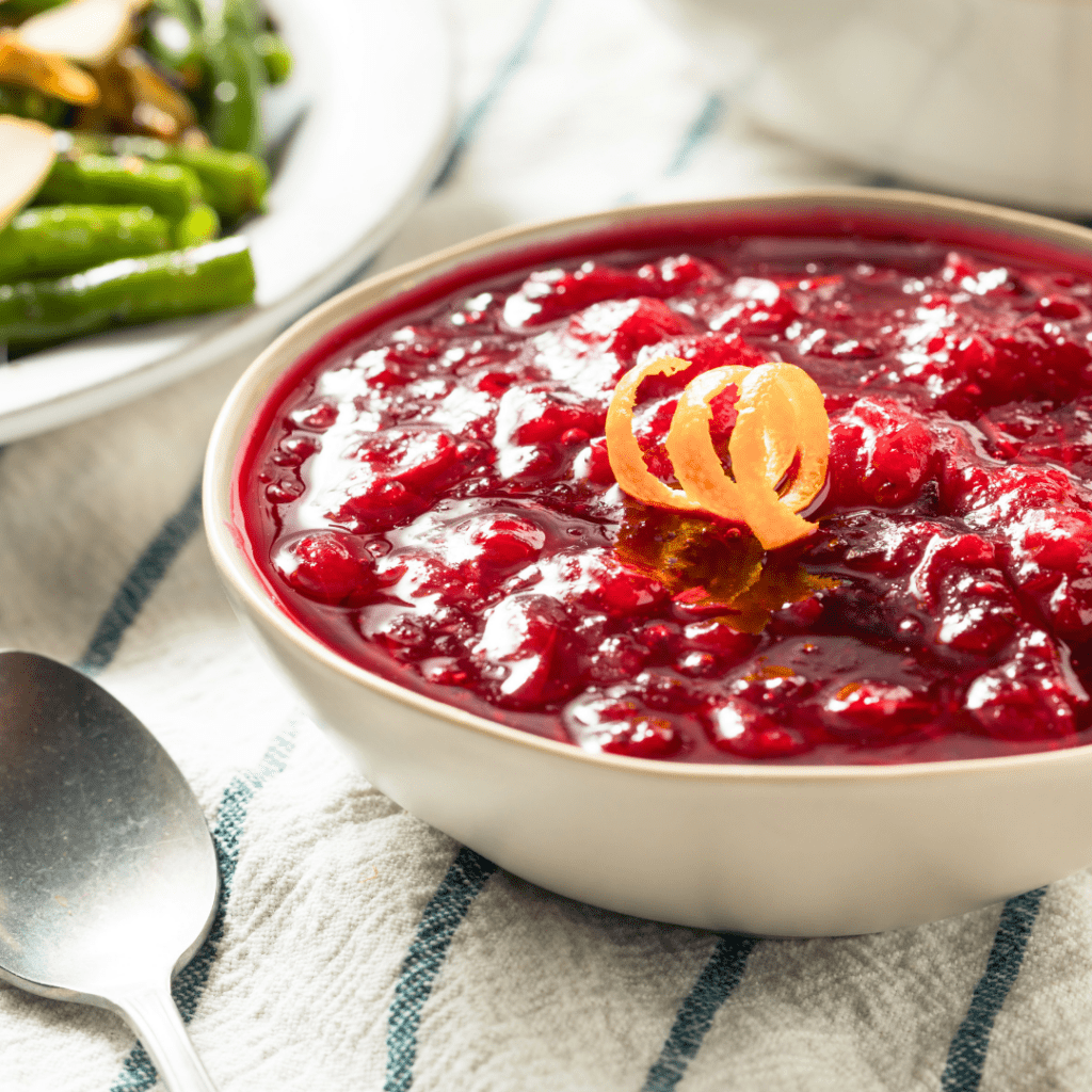 A bowl of cranberry sauce.