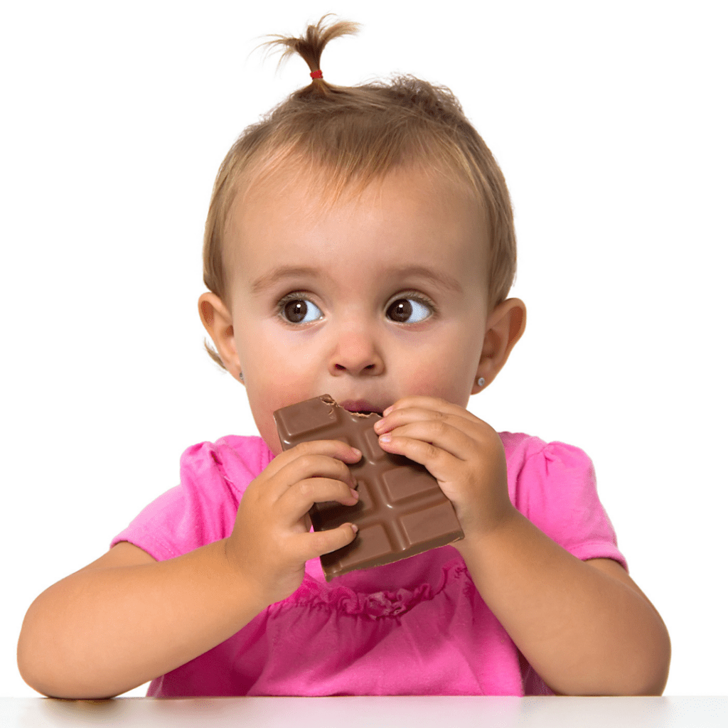 Baby eating a chocolate bar.