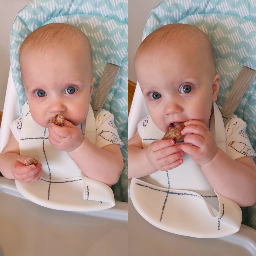 8-month old practicing baby led weaning with a strip of ground beef.
