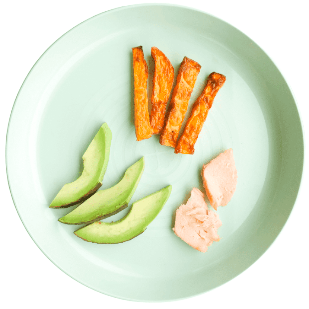 Avocado, salmon, and sweet potato as first finger foods for baby.