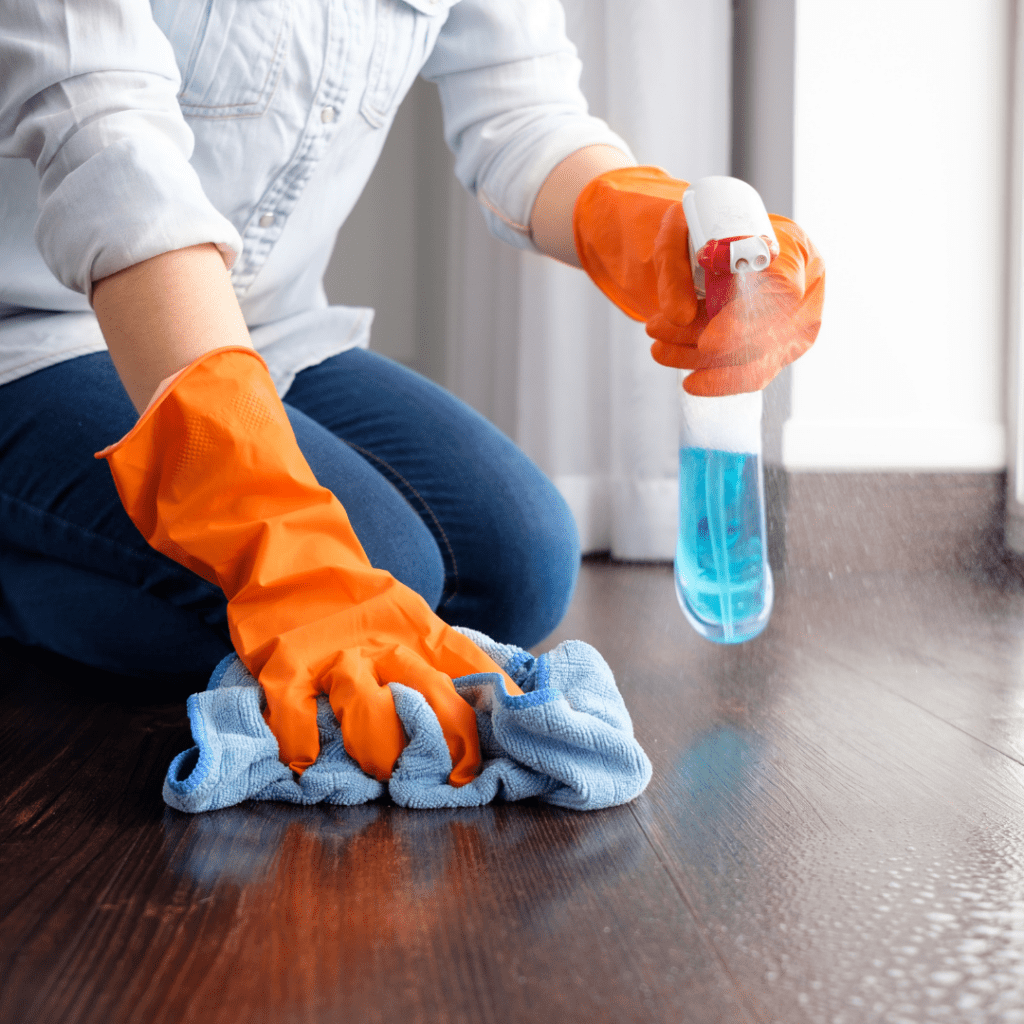 Person cleaning the floors; 2023 holiday gift guide new parents.