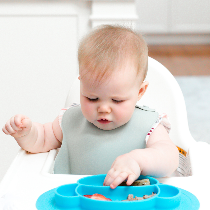Easy baby breakfast for baby led weaning; baby eating in a high chair.