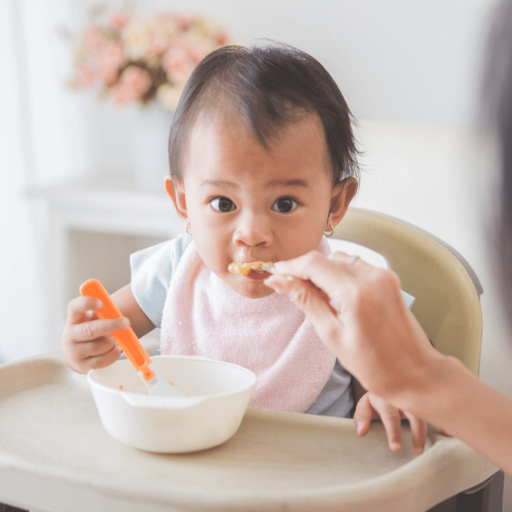 Offer food directly to baby's mouth when baby refuses to eat in their high chair.