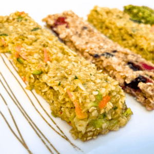 Different flavors of porridge fingers, ingredients can include: shredded coconut, carrot, or zucchini, mixed berries, vanilla extract, seed butter, or nut butter.