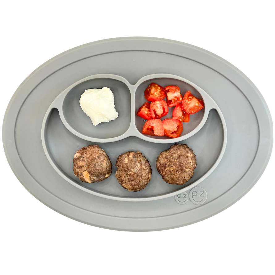Offer ground beef as a patty or meatball for baby to eat meat, keep it moist by adding coconut milk or dairy milk to the recipe.