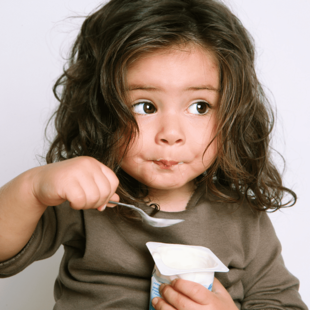 The best yogurt for babies; young toddler eats regular yogurt.
