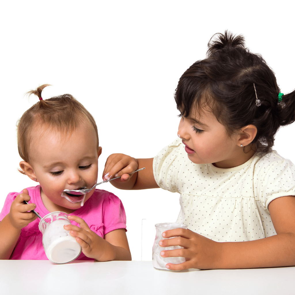 Introduce yogurt early and often to rule out an allergy to dairy products; baby spoon-fed yogurt by toddler.