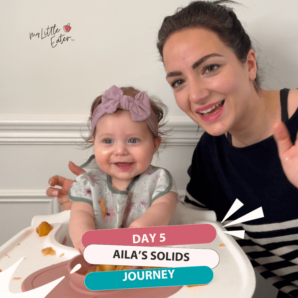 Day 5 of Aila's solids journey; Aila smiling with Edwena Kennedy, RD.