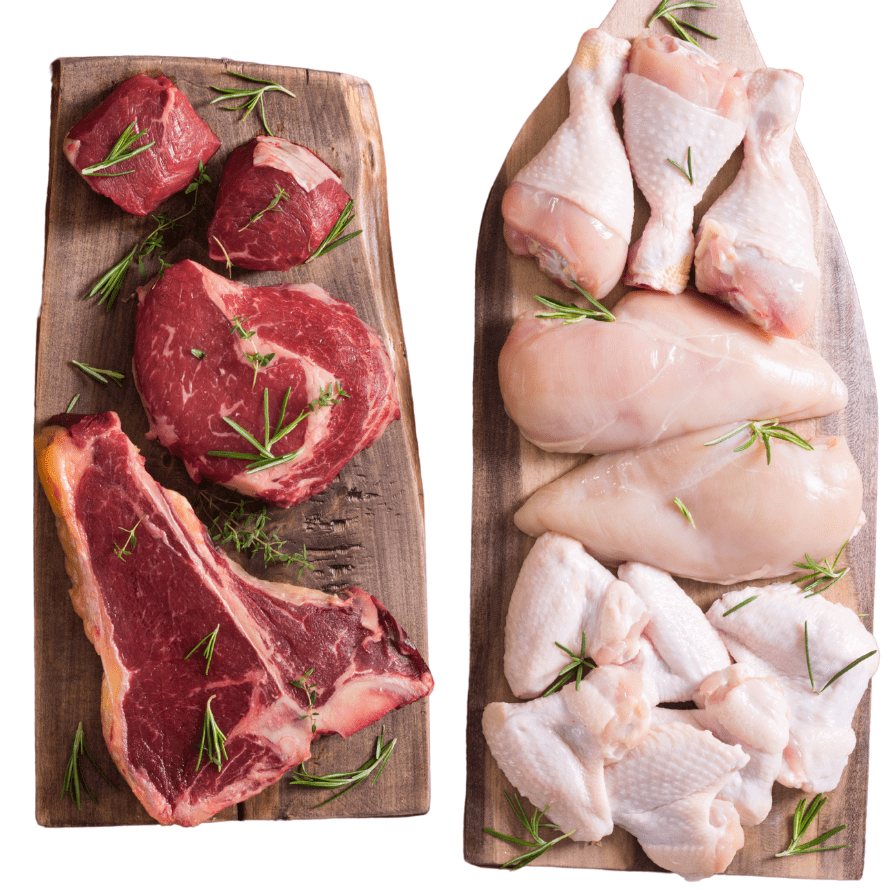 The cutting board on the left has various types of raw red meat, and the one on the right has raw poultry; both some of the best iron rich foods for babies.