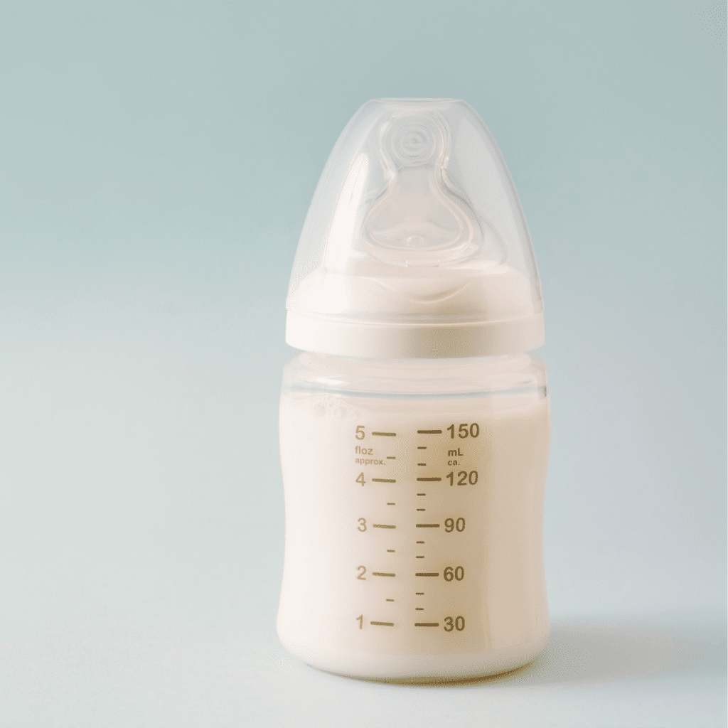 Full bottle of baby formula.