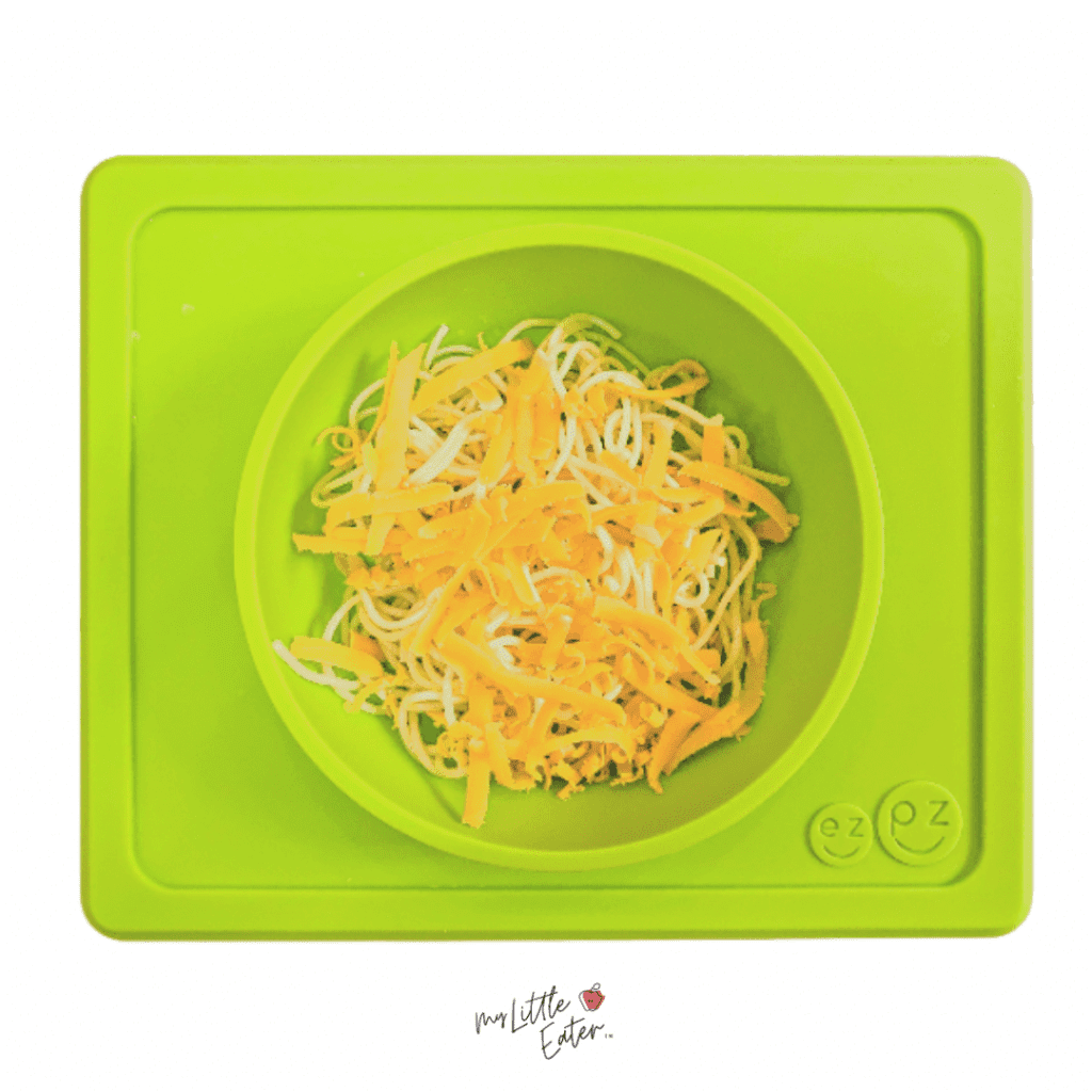 A bowl of shredded cheese for babies.