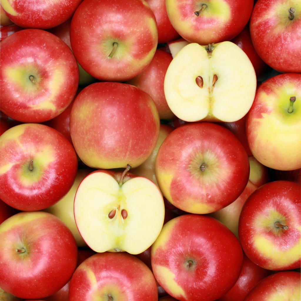 Numerous red apples with a crunchy texture.