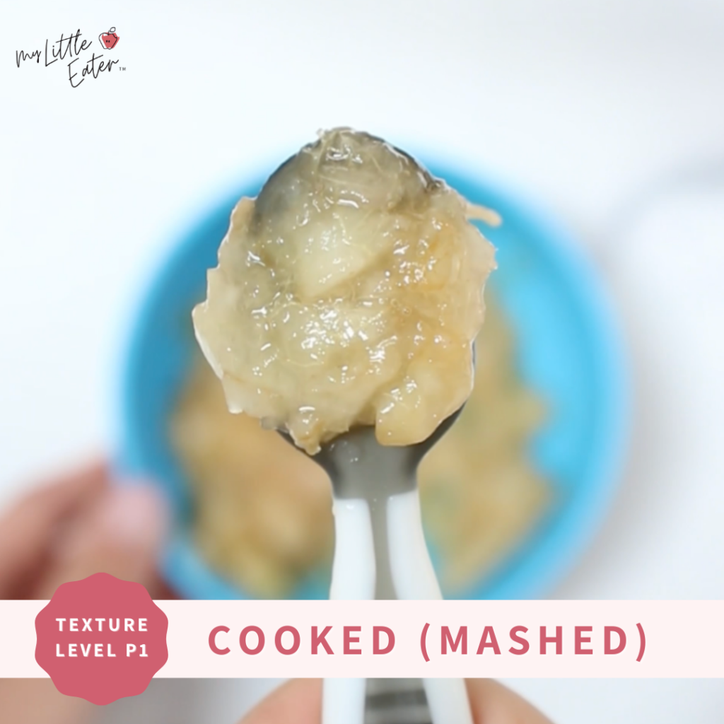 Cook apples and mash them to serve on a preloaded spoon for baby led weaning.