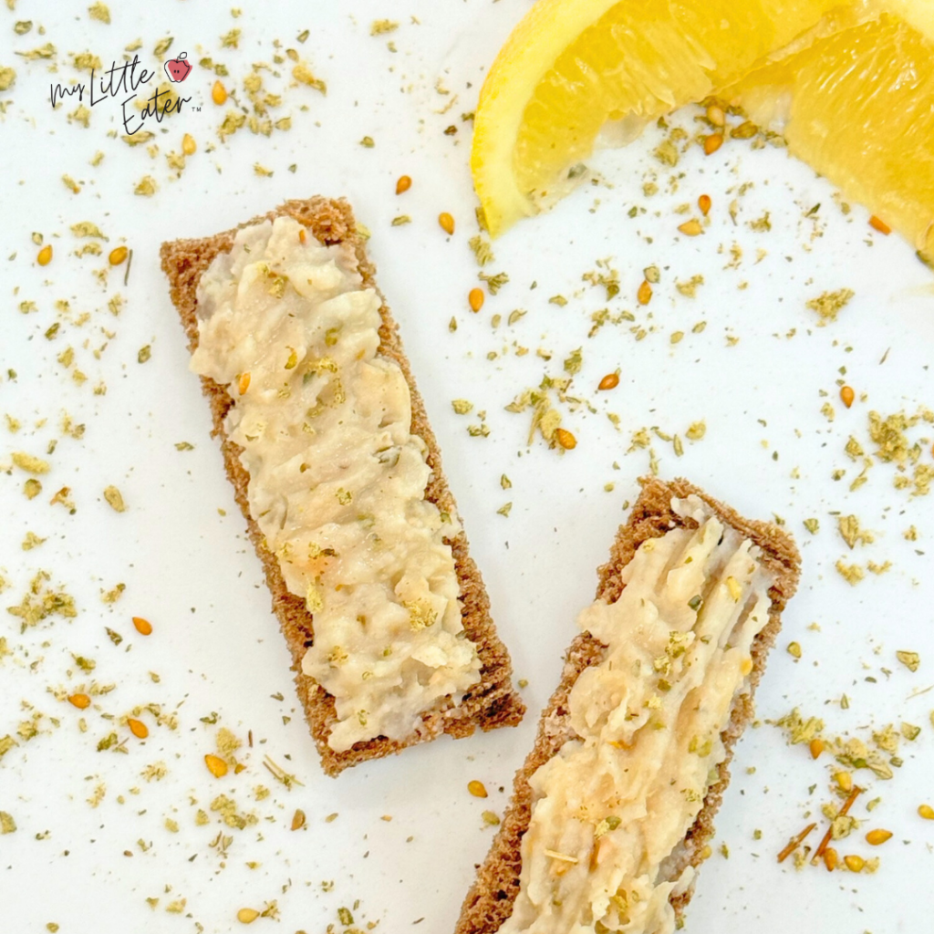 Toast with mashed white beans mixed with lemon and Zaatar spice.