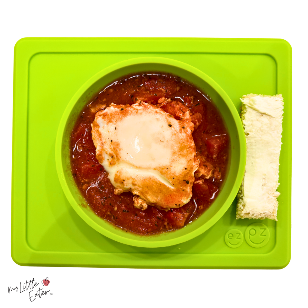 Shakshuka with buttered toast finger on the side for baby led weaning.