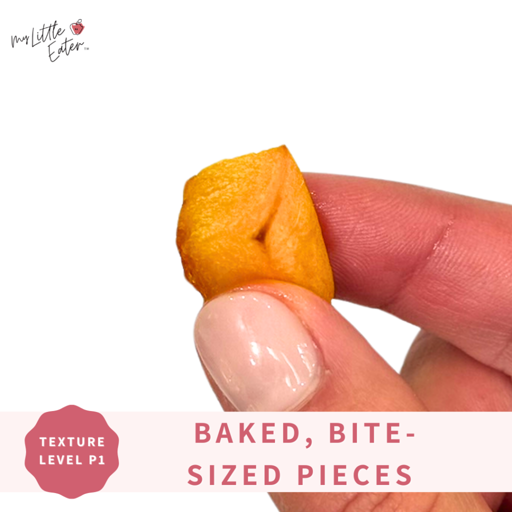 Bite sized pieces of well-cooked pumpkin, shaped into pumpkin cubes for pincer grasp.