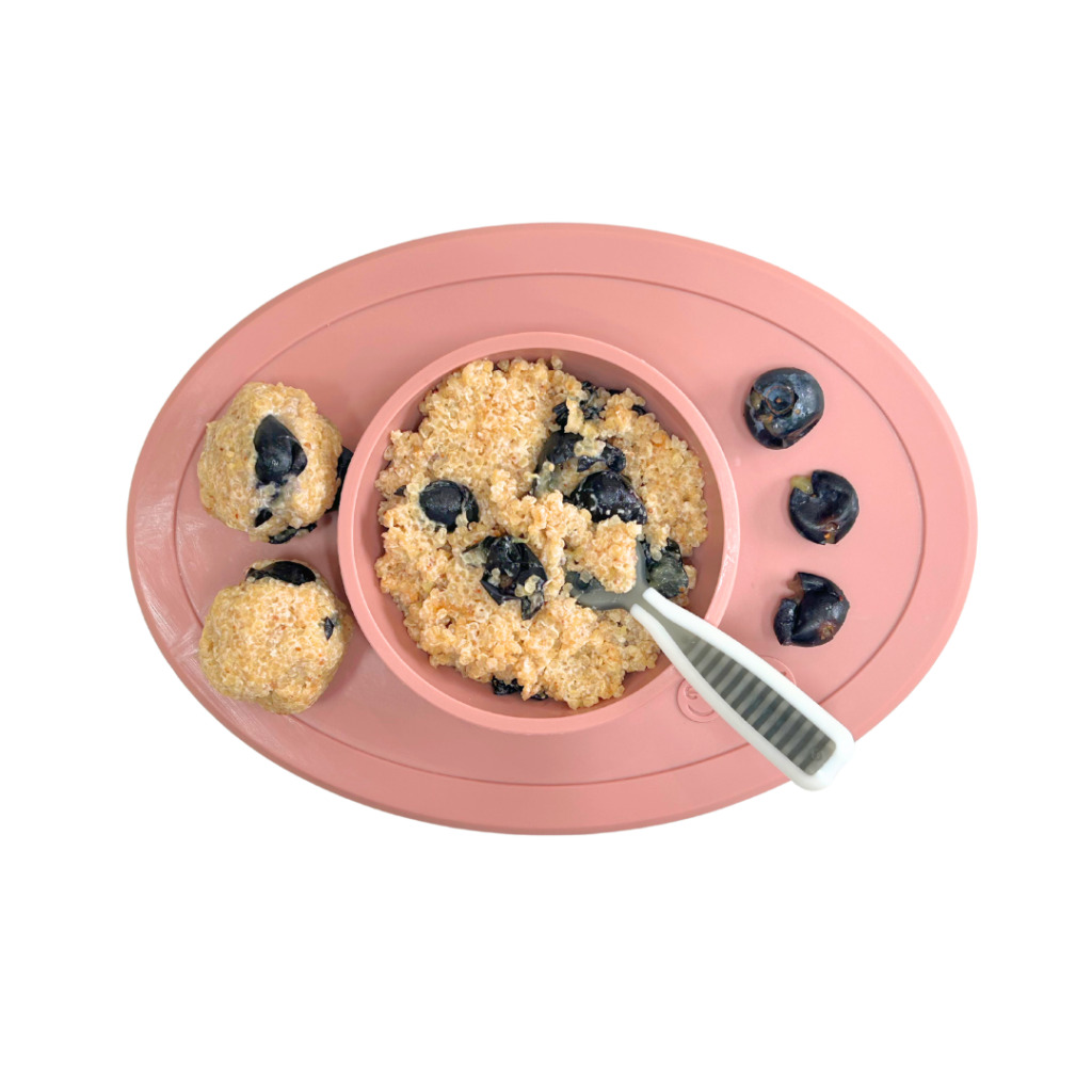 Peanut butter quinoa baby cereal with blueberries.