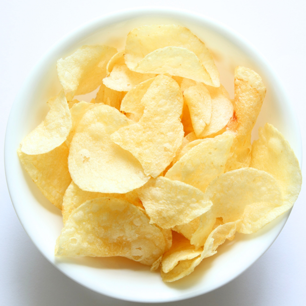 Chips in a bowl as an example of a salty food.