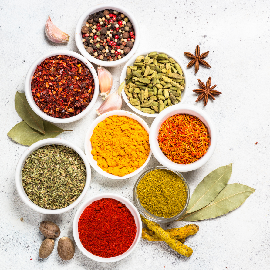 Various spices in bowls that can be used to increase variety in the solid food served to baby.