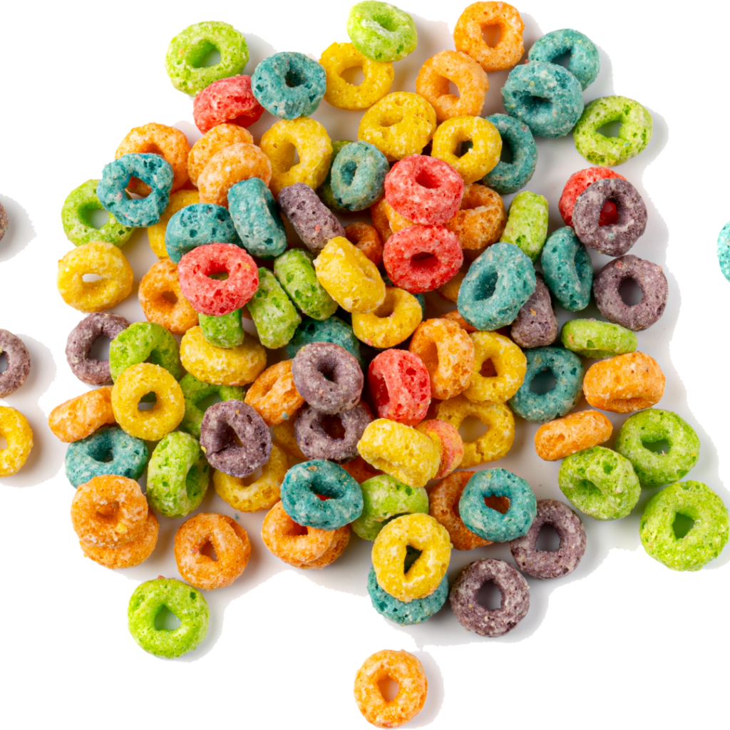 Various brightly colored Fruit Loops cereal pieces in a pile.