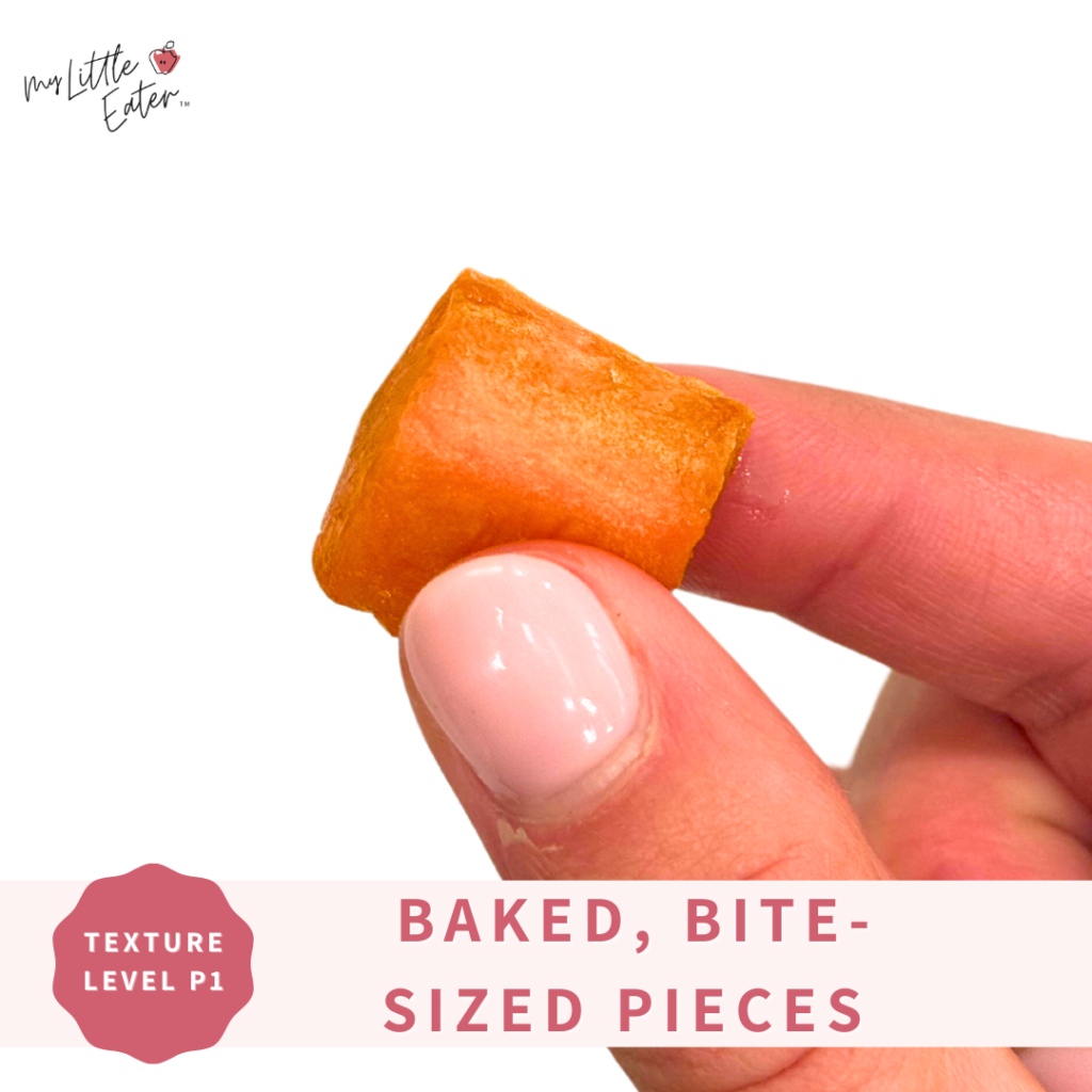 Baked, bite-sized sweet potato chunks picked up with pincer grasp.