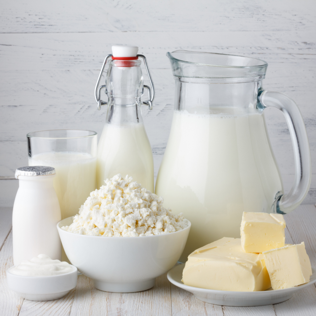 Various forms of dairy including raw milk, soft cheeses, and butter that may cause food poisoning symptoms in babies.