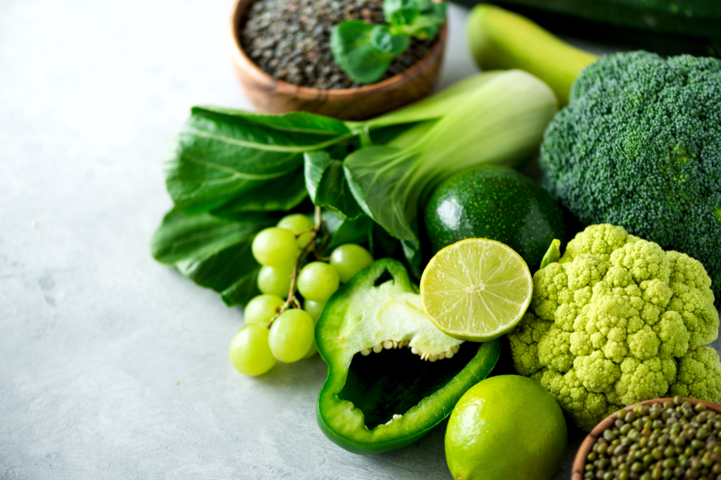 Various green fruits and veggies.