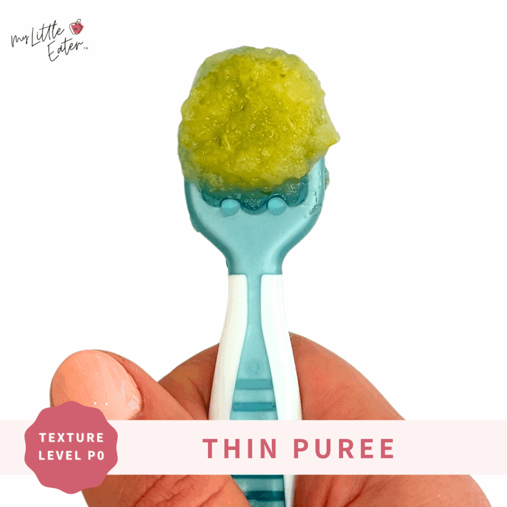 Blended sauerkraut on a spoon as a way to introduce sauerkraut to babies.