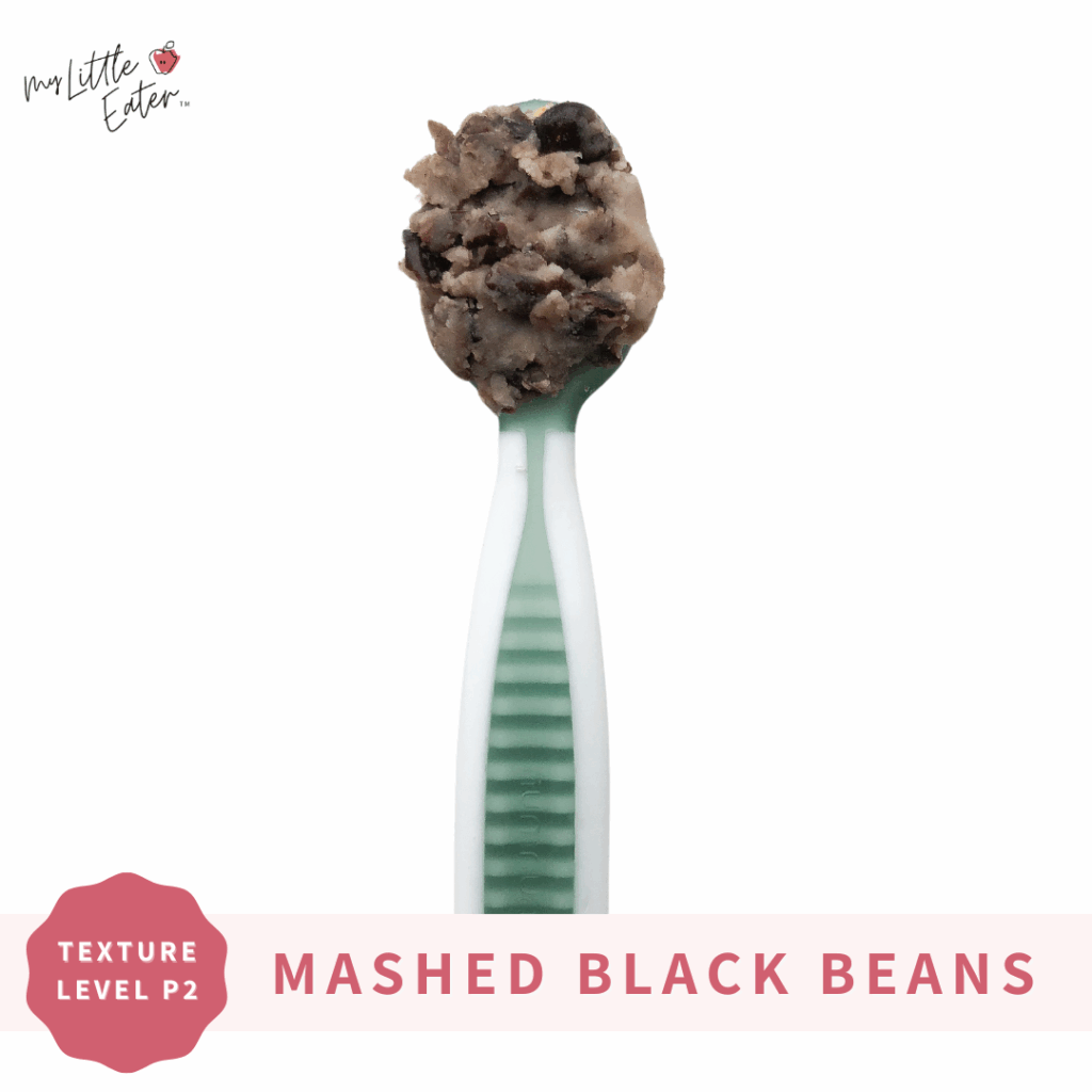 spoon with mashed bean puree
